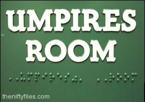 Umpires Room Sign with Braille markings below it