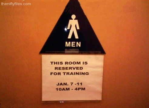 Bathroom door with sign: This room Is Reserved For Training