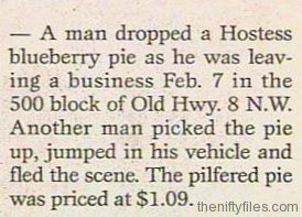 Man drops pie, which is then stolen by a man who quickly drives away